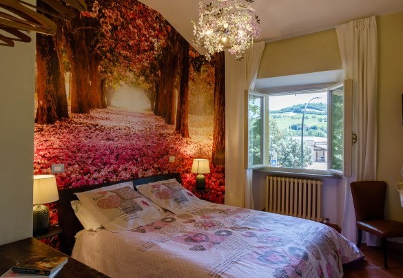 L'incantevole camera da letto matrimoniale al piano superiore - La casa di Nanì
