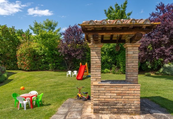 There is a playgroud area situated a few metres from the entrance gate, shaded by ancient oak trees, with a private five-a-side football field - La Colonica  