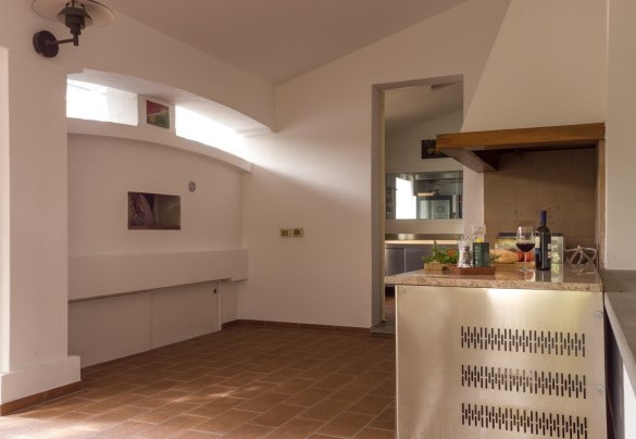 The wood-burning pizza oven and the barbecues - La Scuderia