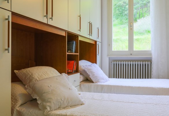 One double bedroom on the upper floor - La villa Dina