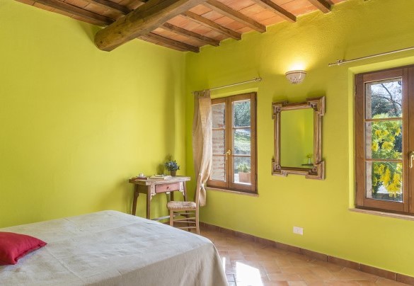 Camera matrimoniale con porta finestra al piano terra - Le Bandite 