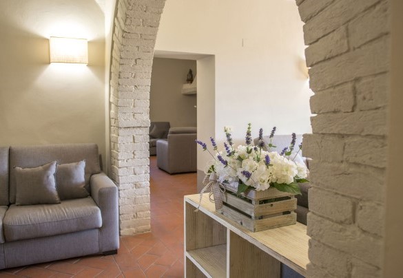 Open plan con salotto e area pranzo al piano terra - Le Caselle 