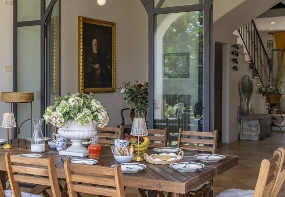 Veranda with dining table - Podere Casanovina