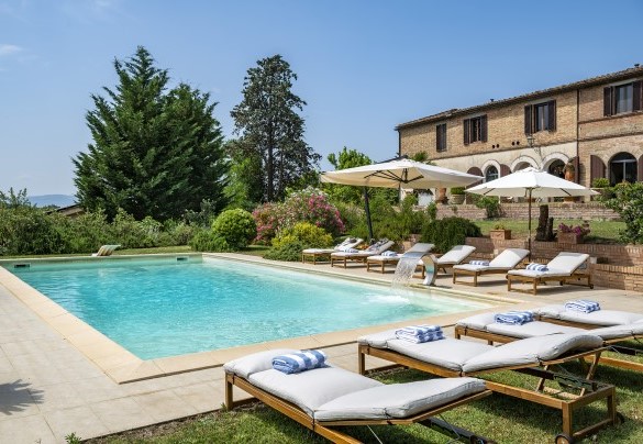 The equipped pool terrace around the pool - Podere Casanovina