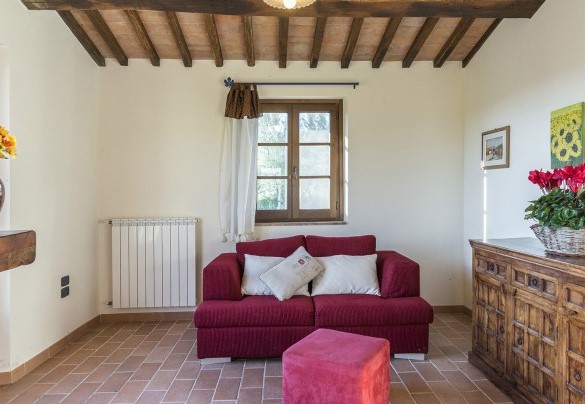 Salotto con caminetto in Annesso n.2 - Podere Collelungo