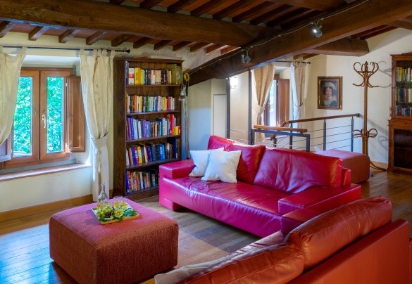 The large sitting room overlooking the pool on the first floor of the main building - Podere Giardino