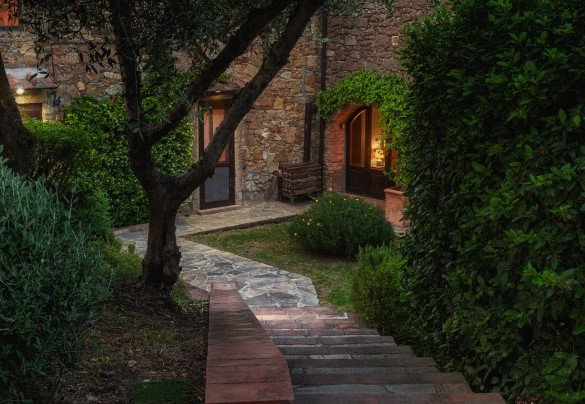 The main entrance is reached up a flight of stone and brick steps – Podere Il Chiesino	