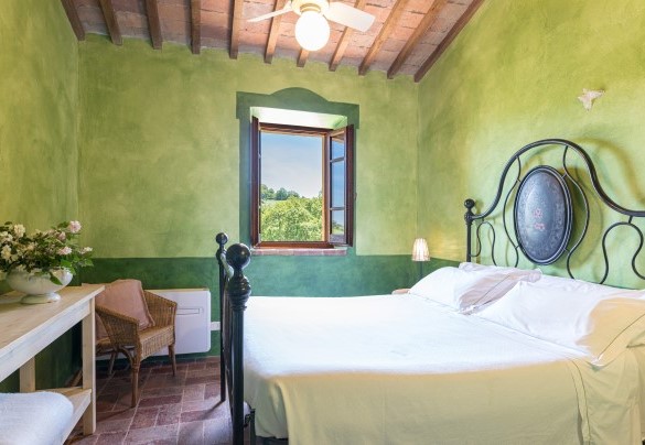 La camera matrimoniale verde al primo piano con bagno en-suite - Podere Pratovecchio