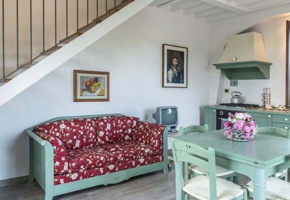 Open-plan with living room and kitchenette on the ground floor in the annex - Podere Sant’Eugenio