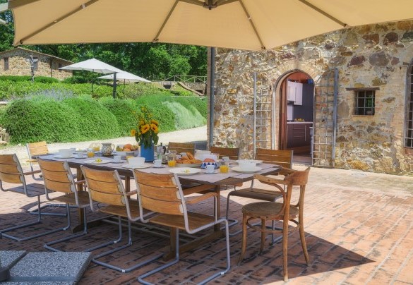 The paved terraces are suitable for setting up long tables for convivial moments – Podere Santa Croce
