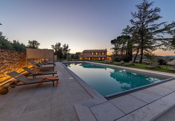  The pool area at sunset - Poggio Ambrato