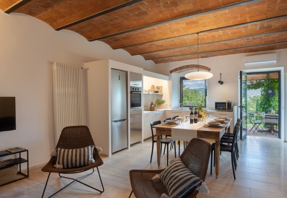 From the pergola, the main entrance leads into an open-plan living area – Poggio Novoli