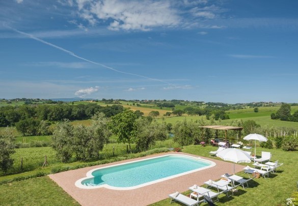 The fenced-in pool lies in a stupendous corner  with a fantastic view  - Poggio Vistabella 10