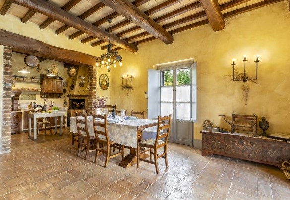Open space with seating, kitchen and dining area and direct exits into the garden - San Rocco
