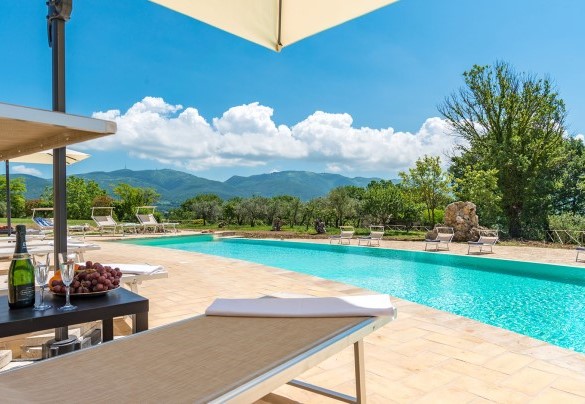 The swimming pool with a view towards the hills opposite - Santa Illuminata