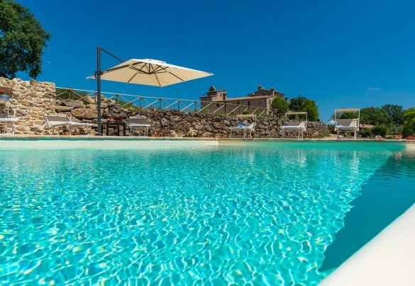 The swimming pool and in the background the Monastery - Santa Illuminata