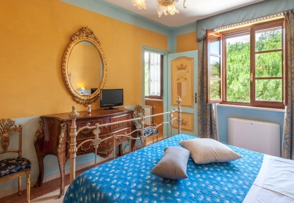 Camera matrimoniale, con letto singolo aggiunto, al piano terra - Tenuta Astolfi 