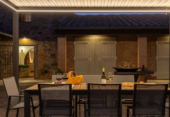 The outdoor table prepared for drinking a good glass of wine in company - Tenuta Francigena