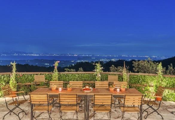 The twinkling lights of the small village of Salò at nightfall – Tenuta Navelli