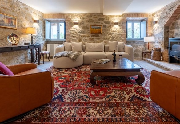 The living room with TV on the ground floor - Tenuta Santa Cristina