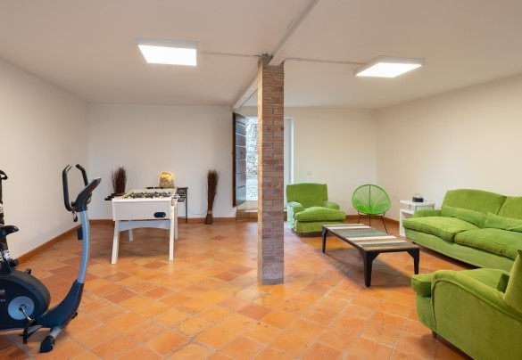 La sala fitness-gioco on the ground floor – Terra di Siena