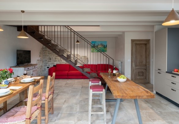 A corten steel staircase leads up to the first floor – Terrazza sulla valle