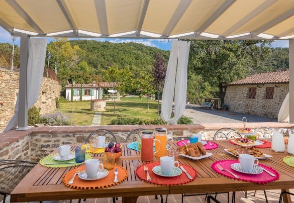 The main kitchen’s porch is equipped for alfresco breakfasts - Torre Ginestre