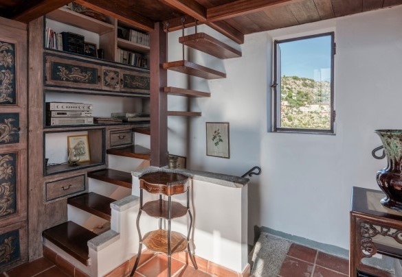 A last spiral staircase leads to the panoramic terrace on the roof of the tower - Torre Grimaldi