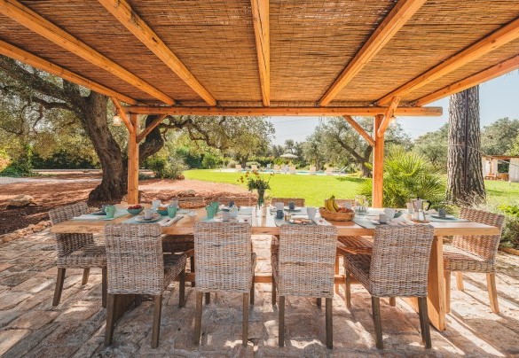 The charming outdoor gazebo complete with table and chairs and fixed barbecue, ideal for outdoor dining -Trulli Biancapetra