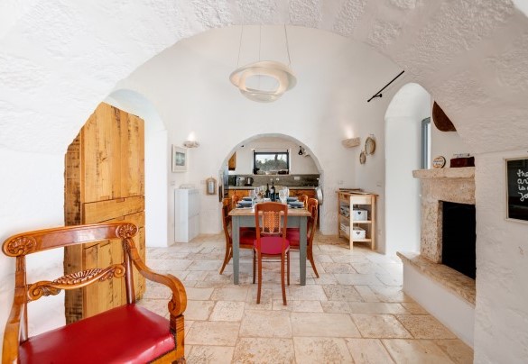 L’ambiente unico con living, pranzo e cucina - Trullo Luna