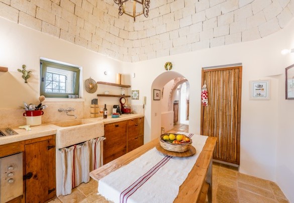 Kitchen connected to the dining room - Trullo Magnifico