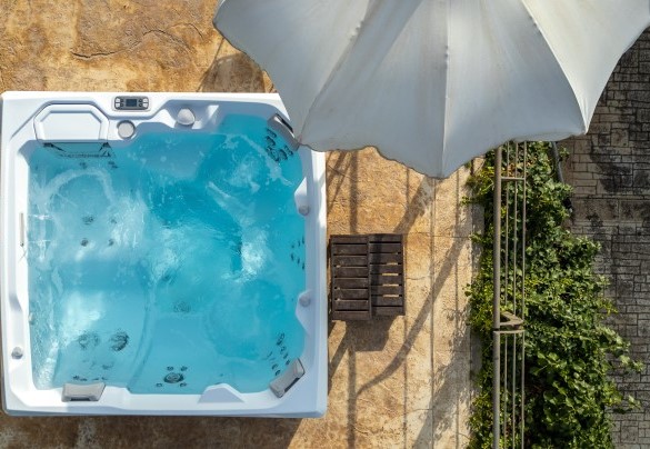 The hot tub is in the pool area - Villa Alessia