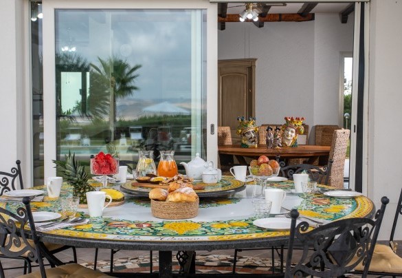 The outdoor dining area by the exit of the living  - Villa Alessia