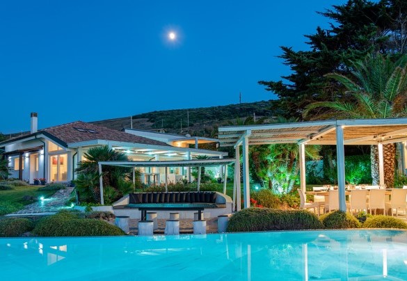 The magnificent sea-water infinity pool  is easily accessible from the garden – Villa Ambra