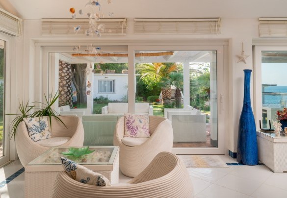 Living  area is always the same dominant white with ceramic inserts in shades of blue and aquamarine – Villa Ambra