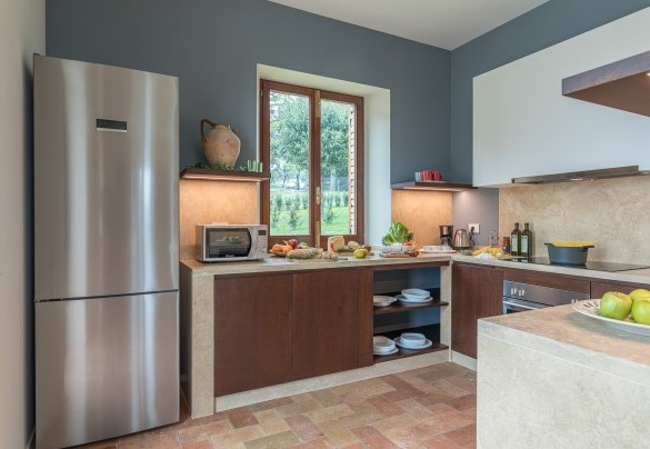 L'accogliente cucina con accesso diretto all'esterno - Villa Anna Elisa