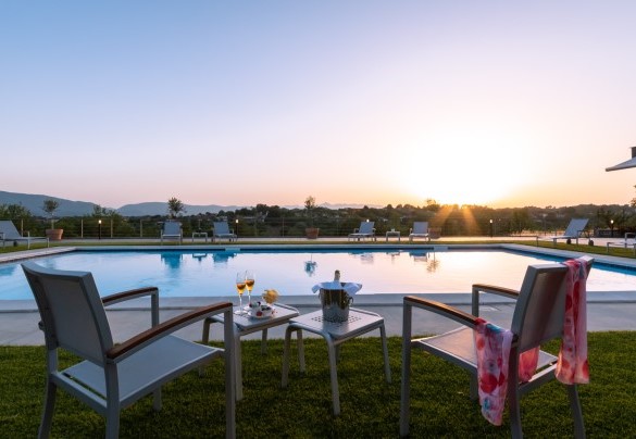 The swimming pool in the sunset light – Villa Atmosfere