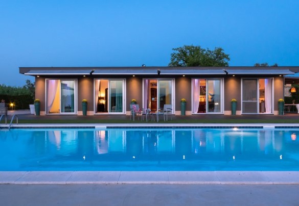The chromatic lights inside the living room create a unique atmosphere - Villa Atmosfere