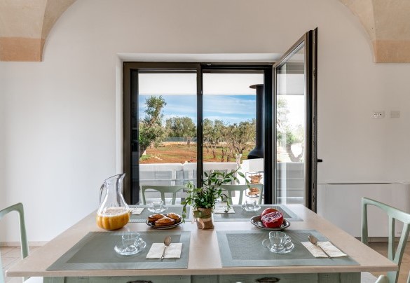 From the kitchen dining area you have a relaxing view of the olive trees on the property - Villa Belkis