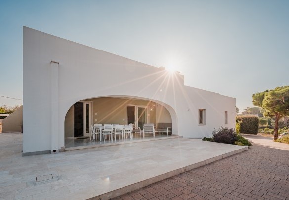The panoramic veranda shading the elegant entrance to the villa -Villa Bellina 