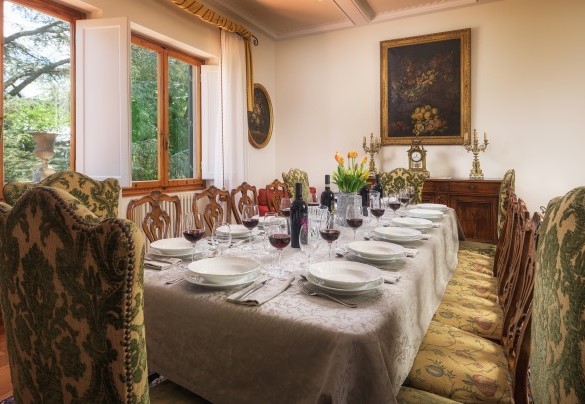 The dining area with the table set up for important lunches - Villa Beltrami 