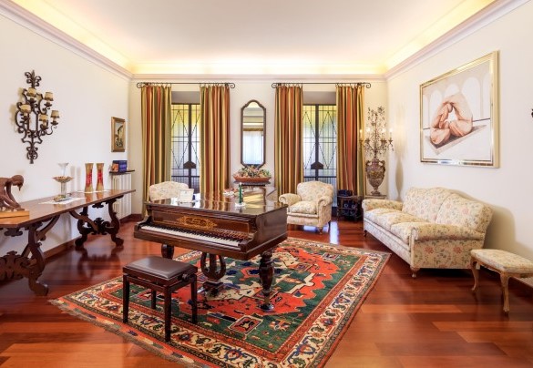 The living room with a piano - Villa Beltrami