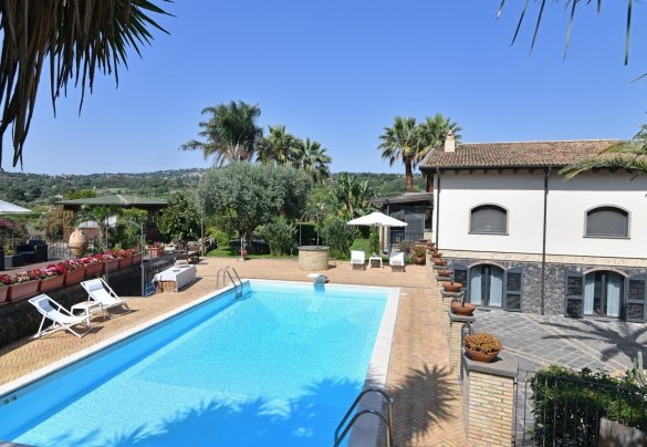 La zona piscina - Villa Biddizza