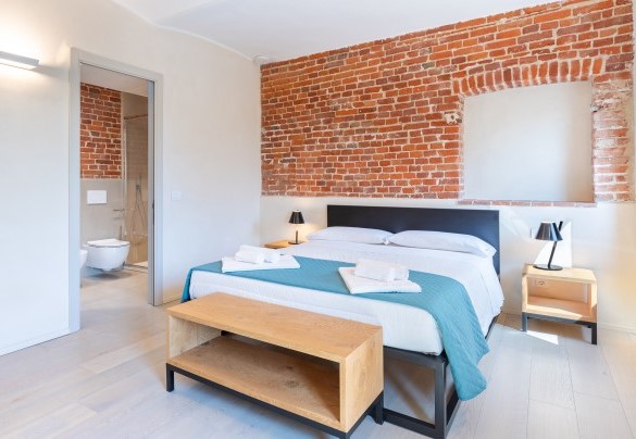 View of the first double bedroom with ensuite bathroom - Villa Boemia