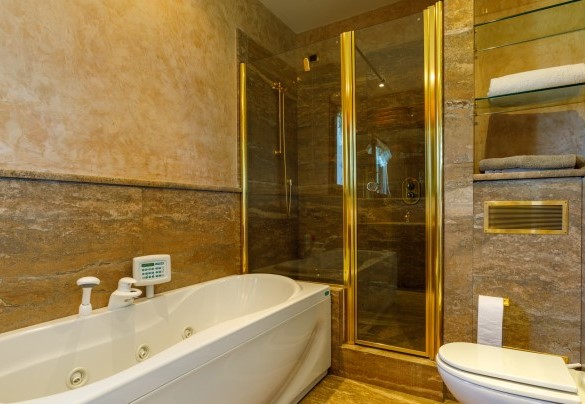 The en-suite bathroom of the master bedroom is dominated by marble - Villa California