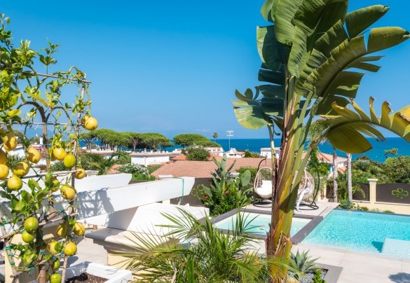 The wide selection of Mediterranean and tropical plants integrates perfectly with the elegant stairways and terraces – Villa Callari
