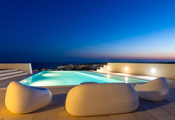 The magic of the sea view swimming pool in the night version - Villa Calypso