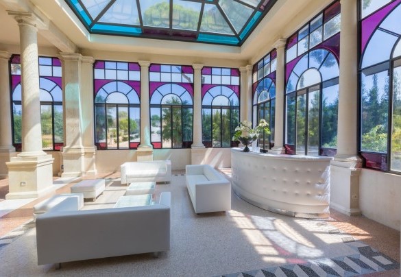 The majestic winter garden, spectacular with its Art Nouveau windows. Villa Capozza