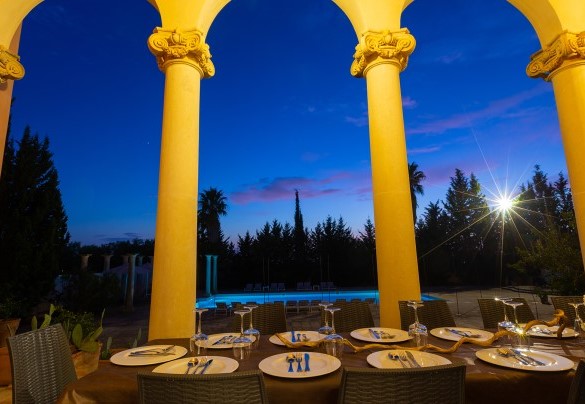The table under the porch at night. Villa Capozza
