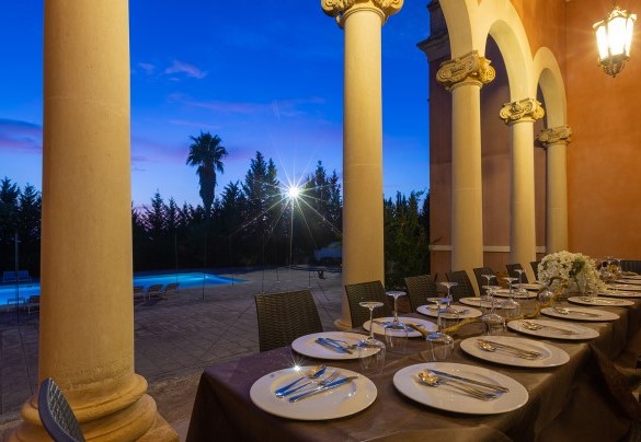The table under the porch at night. Villa Capozza